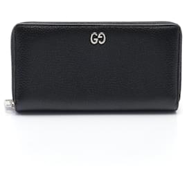 Gucci-Portafoglio lungo rotondo in metallo GG di Gucci-Nero