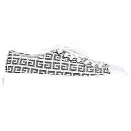 Sneakers basse Givenchy City 4G-Monogram in pelle nera e bianca Altro