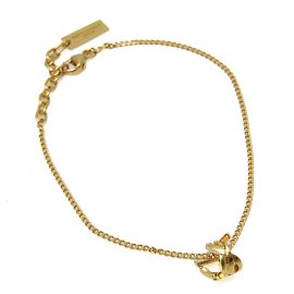 Pulsera de charm de metal dorado Saint Laurent Dorado