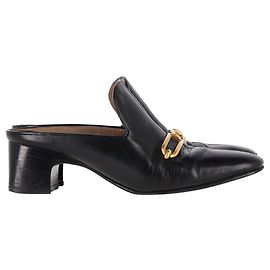 Mules Hermès Diane avec boucle Roulis en cuir de chèvre noir Marron Rouge