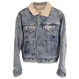 Céline Jaqueta de denim desbotada oversized forrada com shearling da Celine em algodão azul claro Azul Azul claro