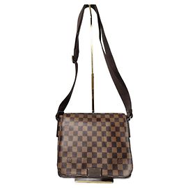Bolso mensajero Louis Vuitton Damier Ebene District PM marrón Castaño
