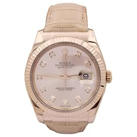 Rolex-Montre Rolex "Datejust" or rose, diamants, cuir.-Autre