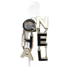 Orecchini a perno Chanel B22A Nero Bianco D'oro