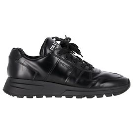 Sneakers basse con lacci Prada Prax 01 in pelle di vitello nera Nero