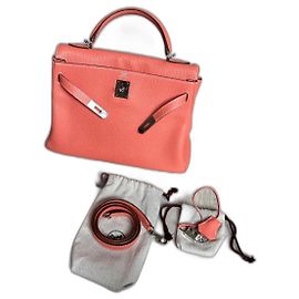 Hermès Kelly 32 Retourne Cuir Corail Corail