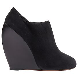 Alaïa Azzedine Alaia black suede curved wedge round toe ankle bootie Black