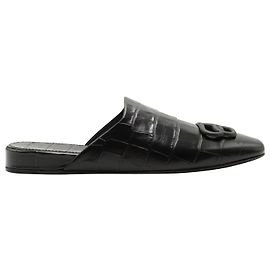 Mules de cuero de ternera con estampado Croc de Balenciaga Negro