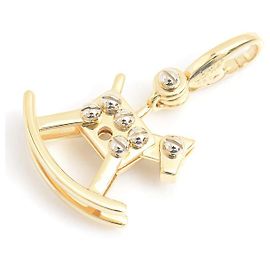 Pendentif en or en forme de cheval à bascule Cartier Doré
