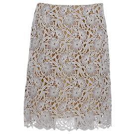 Gonna in pizzo lunghezza ginocchio Burberry in cotone bianco Bianco Crudo