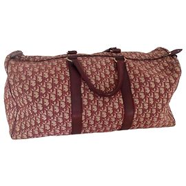 Grande Bolsa de Viagem Dior em Lona Monogram e Couro Bordeaux