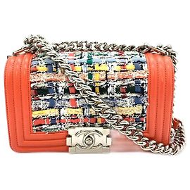 Bolsa de ombro em couro tweed Chanel Boy com corrente Laranja
