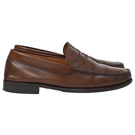 Mocassins polidos em couro de bezerro marrom com logotipo em relevo da Tod's Marrom