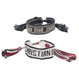 2 small Dior buy posters with 4 Christian Dior bracelets .