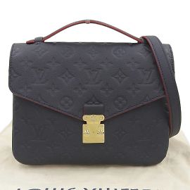 Pochette Metis MM M44071 in Monogram Empreinte Louis Vuitton Rosso