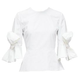 Blusa peplum com mangas de laço em popeline de algodão Kemi Roksanda Branco