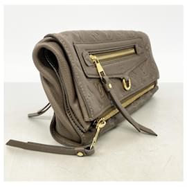 Louis Vuitton-Bolsa Clutch Louis Vuitton Monogram Empreinte Petillante-Outro
