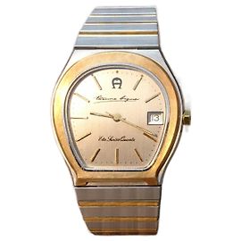 Etienne Aigner quartz watch ref 463 221 Silvery Golden