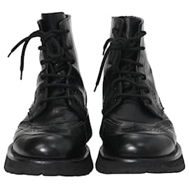Alexander Mcqueen-Alexander Mcqueen Brogue Detail Combat Boots in Black Leather-Black