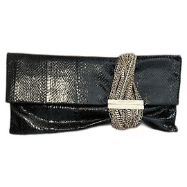 Jimmy Choo Clutch aus schwarzem glänzendem Pythonleder Schwarz
