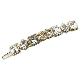 Fermaglio in strass con il logo Coco in metallo di Chanel D'oro