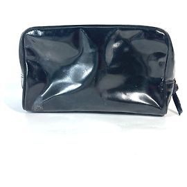 Pochette noire Chanel avec le logo CC de Coco Noir