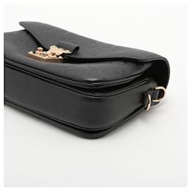 Louis Vuitton-Pochette Metis em monograma empreinte Louis Vuitton-Preto