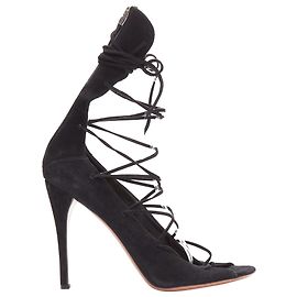 Alaïa Sandali con tacco in pelle scamosciata Alaia con lacci e zip sul retro Nero