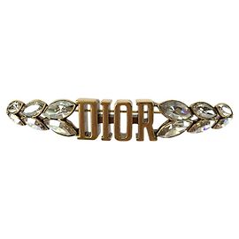 Christian Dior Broche de metal dourado com logo de strass Dior Dourado Metálico