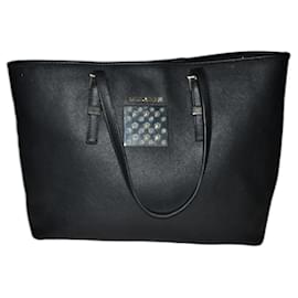 Sac bowling combiné en cuir et coton - Homme | MANGO Tunisie