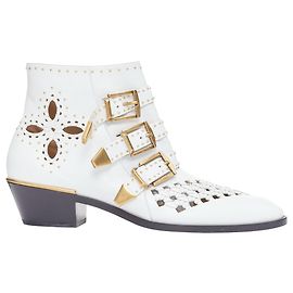 Chloé Stivali da cowboy in pelle con ritagli e hardware Chloe Susanna Bianco