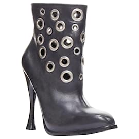 Alexander Mcqueen-Alexander McQueen grommet studded spool pirate ankle boots-Black