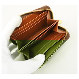 Louis Vuitton-Louis Vuitton Zippy coin purse-Brown