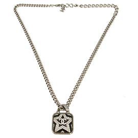 Collana pendente a stella in metallo e pietra Chanel A23K Coco Mark Nero Argento