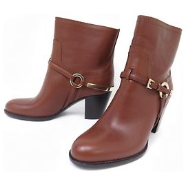 NUEVE BOTAS CHRISTIAN DIOR CON HEBILLAS 36 BOTAS Castaño