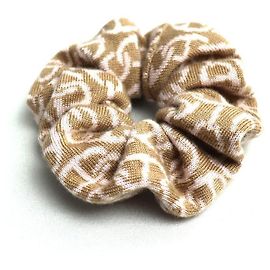 Hermès Scrunchie de cashmere e seda Hermes Naoussa Claudia Bege