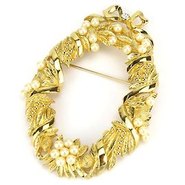 Broche de metal Christian Dior dourada Dourado