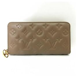 Louis Vuitton-Louis Vuitton Monogram Embossed Zippy Wallet-Beige