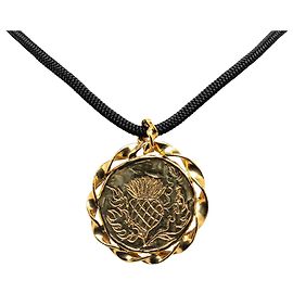 Collier en or avec médaillon ananas Yves Saint Laurent Doré