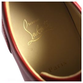 Baskets en cuir Louis Junior Spikes de Christian Louboutin Rouge Rouge