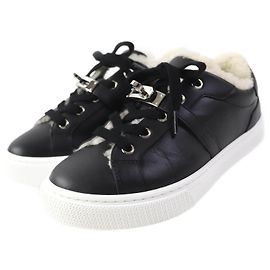 Hermès Schwarze Schafsleder Sneakers Hermes Kelly Buckle Schwarz