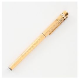 Penna a sfera Trinity di Cartier in oro D'oro