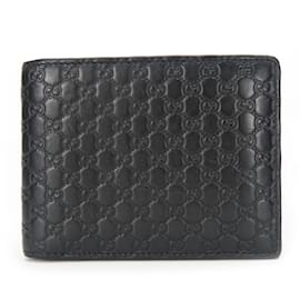 Gucci-Carteira dobrável Gucci em couro preto-Preto