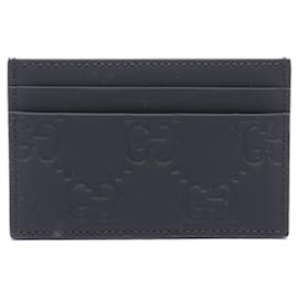 Gucci-Carteira de cartão em efeito de borracha GG Gucci preta-Preto