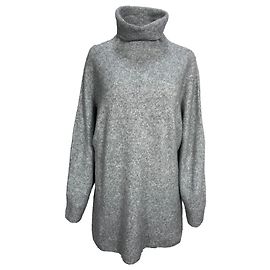 The row Der Rollkragenpullover aus grauer Wolle Grau