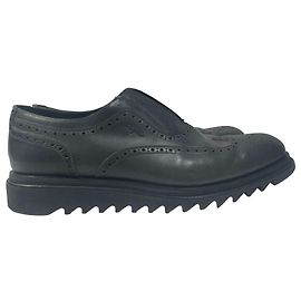 Salvatore Ferragamo Lasercut Slip-On Brogues in Black Leather Black