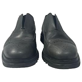 Salvatore Ferragamo- Salvatore Ferragamo Lasercut Slip-On Brogues in Black Leather-Black