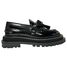 Mocasines Chunky de Cuero Negro con Detalle de Borlas de Hierro Sandro Paris Negro