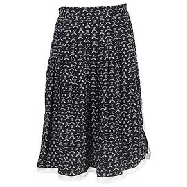 Falda midi plisada estampada de flores Chloé en algodón negro Negro