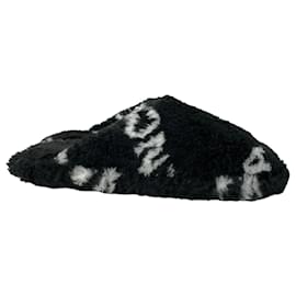 Balenciaga-Balenciaga All Over Logo Slippers in Black Faux Fur -Black